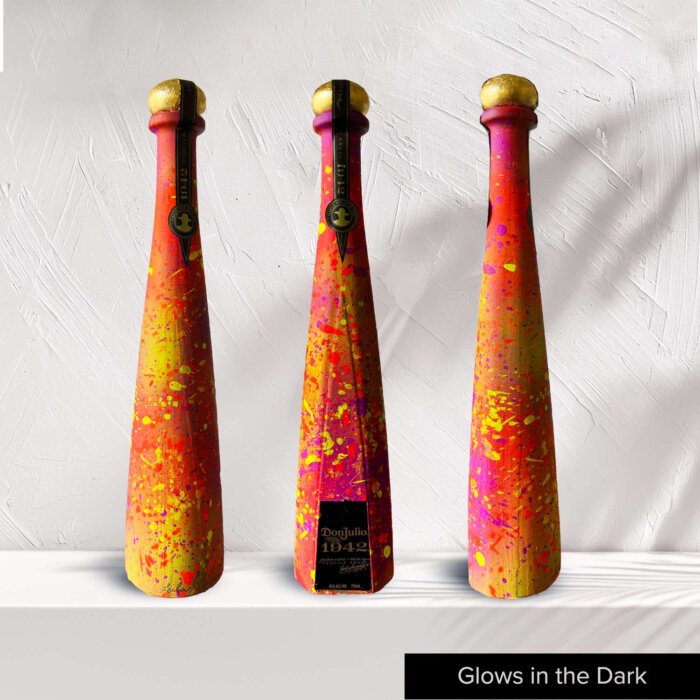 3 hand-painted tequila bottles from artist Lelia Parnia.