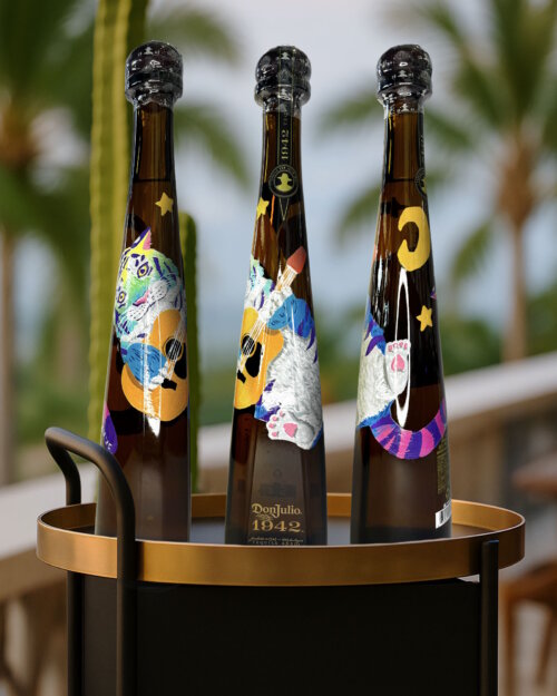 3 hand-painted tequila bottles from artist Maxxine Valentine.